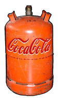 A LA COLA